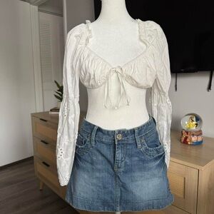 white cropped blouse with detailed puffed sleeves